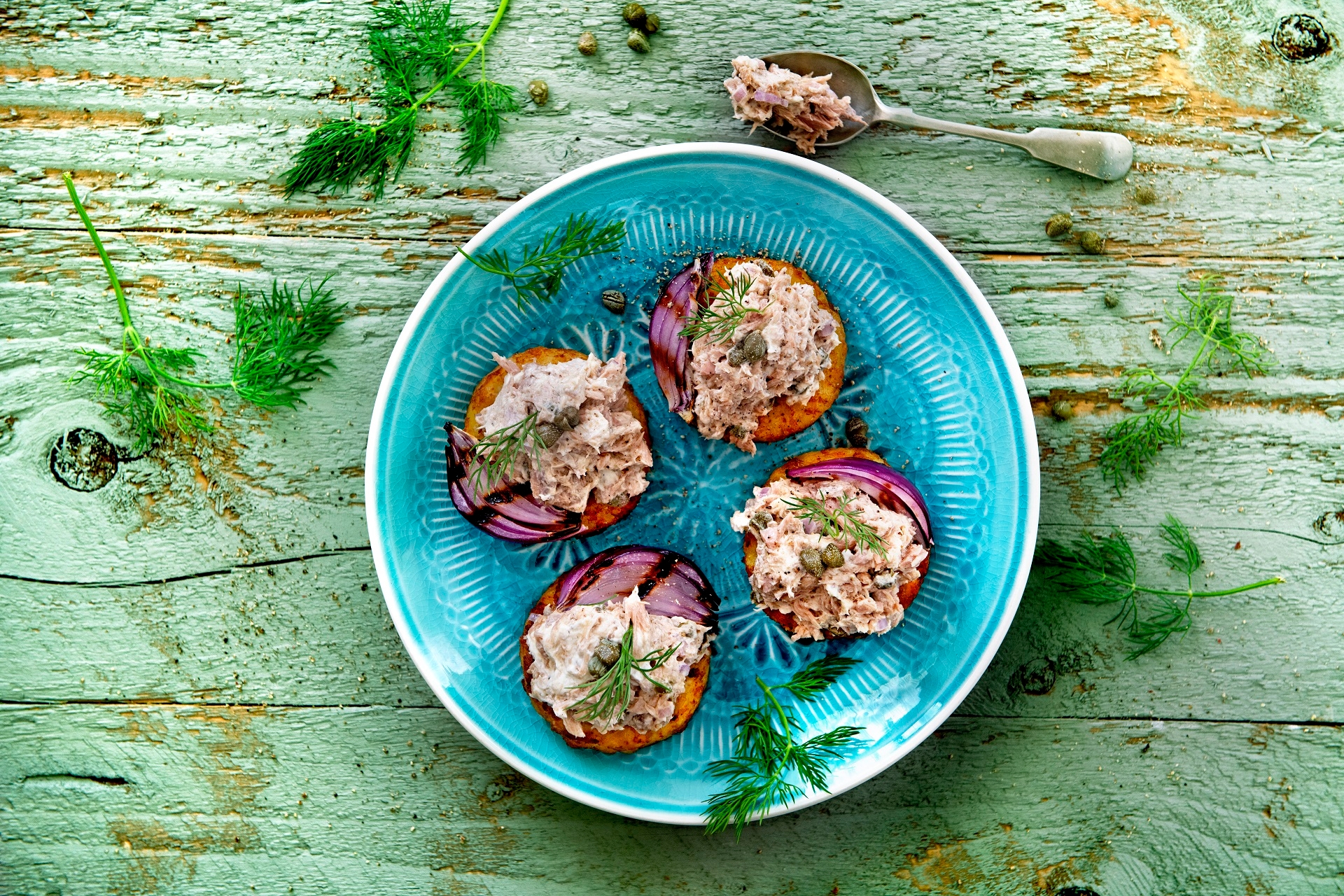 Rosti round with tuna salad and roasted red onion