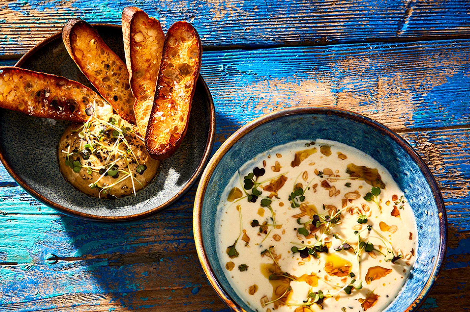 Recept image Potato-onion soup with porcini mushroom sauce and crostini.